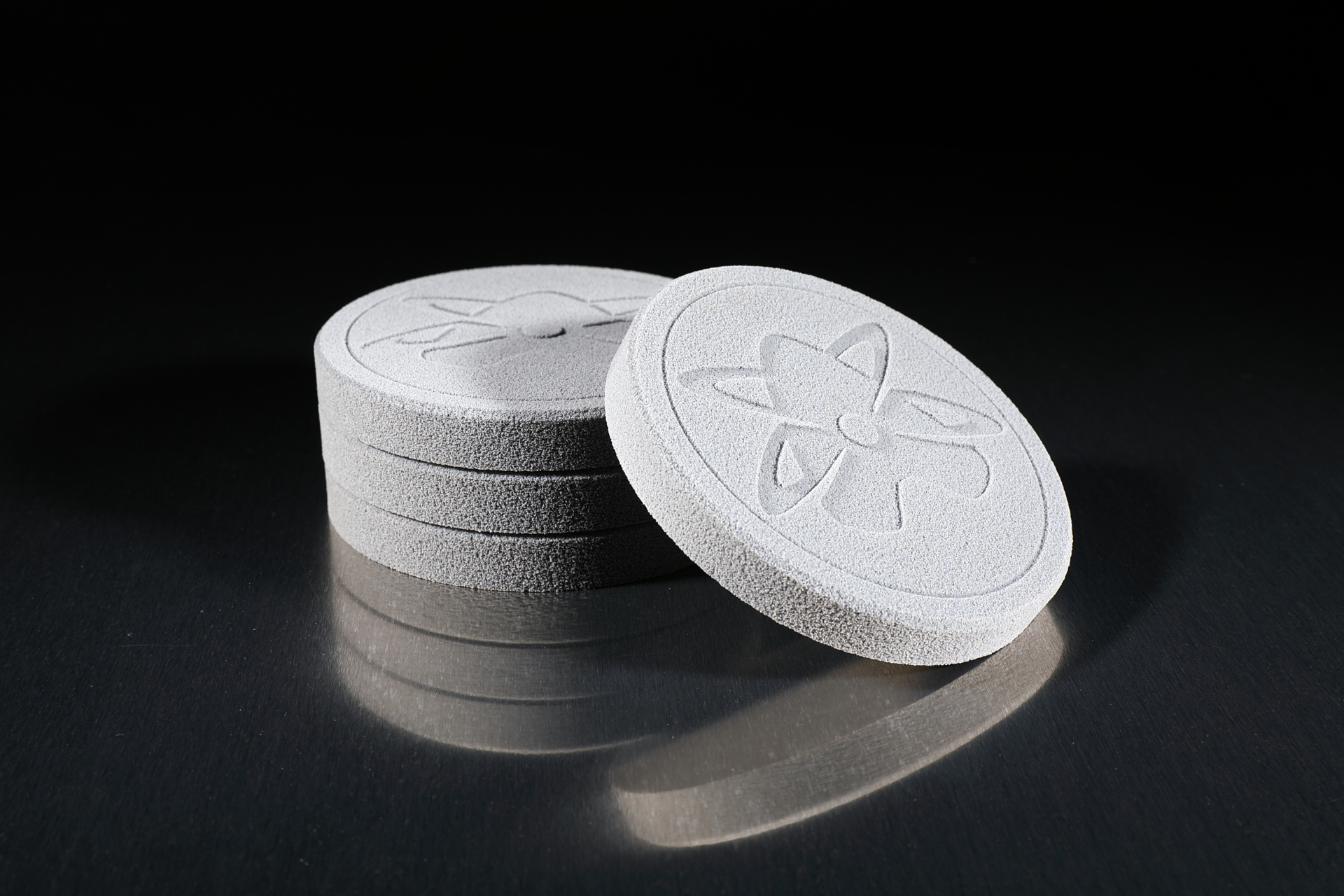 logodrinkcoasters4pack Atomik Climbing Holds